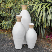 Load image into Gallery viewer, White terracotta slimline vases with rattan detail.