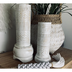 Timor carved candle pillars in  white wash. - Unique Imports